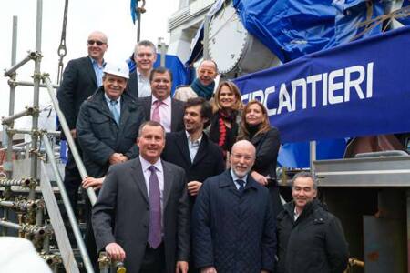 The Oceania Cruises and Fincantieri Executive Teams on the newly-laid keel section of <em>Marina</em> in the
building dock of Fincantieri’s Sestri Ponente yard outside of Genoa.