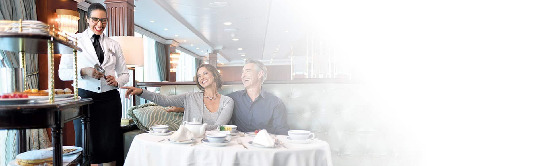 Couple enjoying afternoon tea on board Sirena