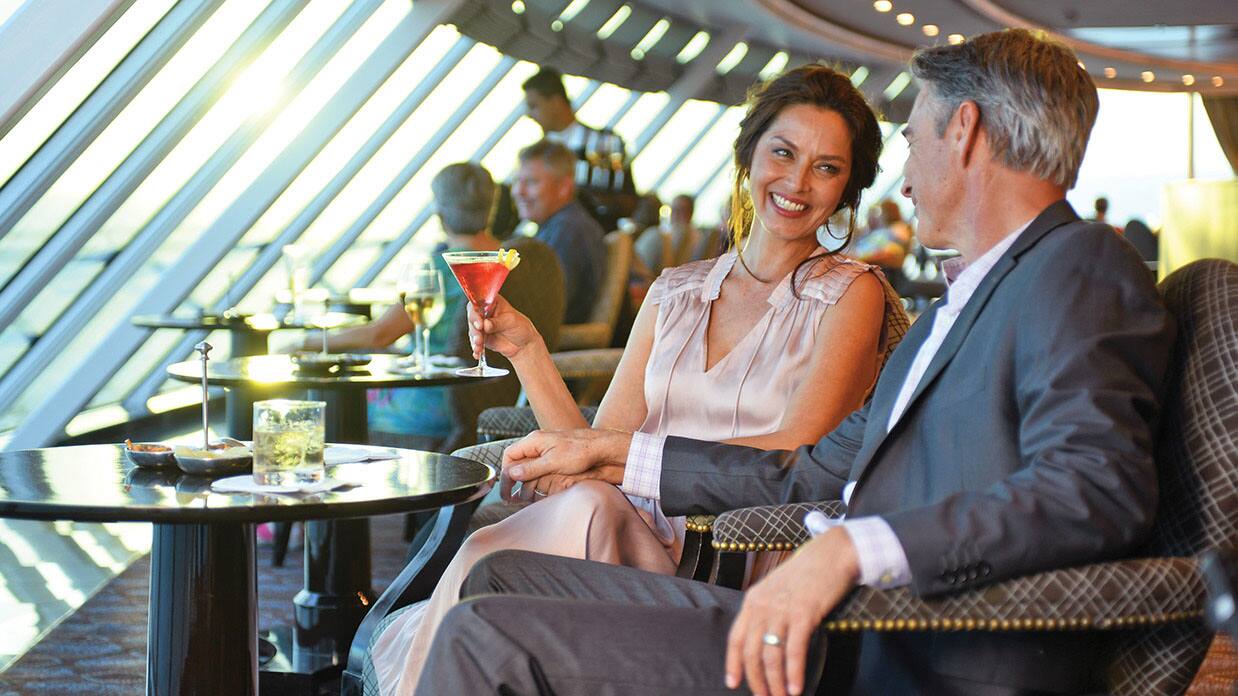 couple at horizons bar, oceania cruises