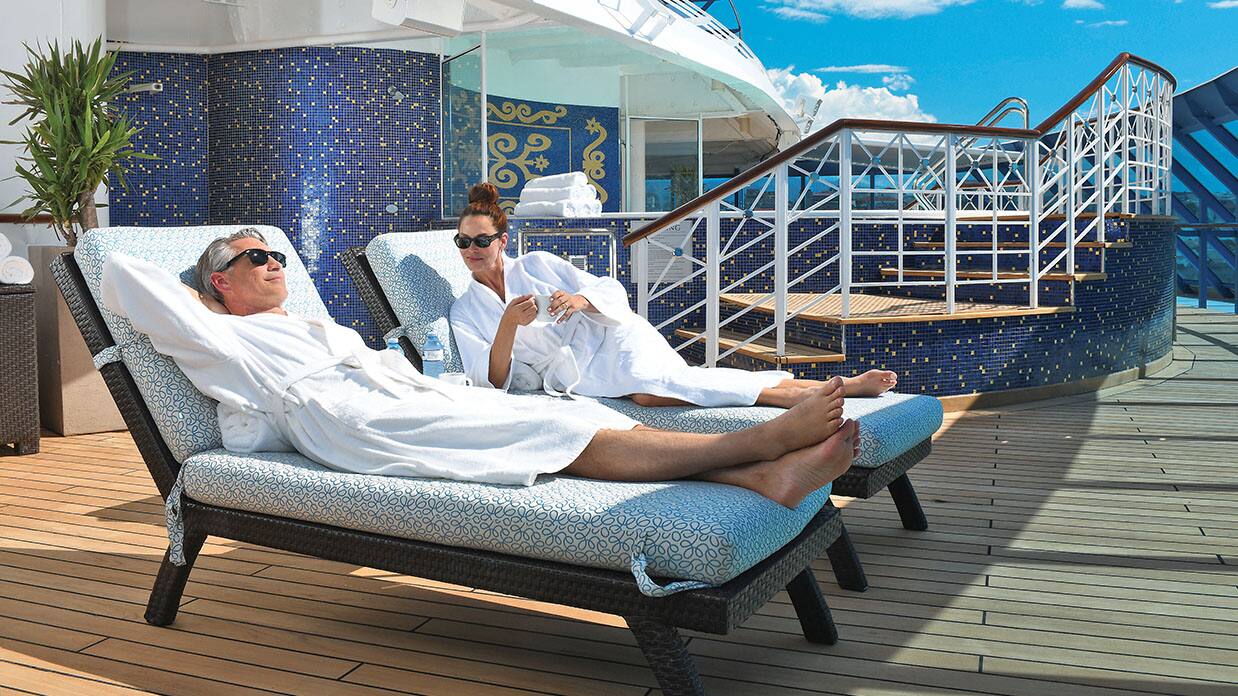 couple on aquamar spa terrace, oceania cruises