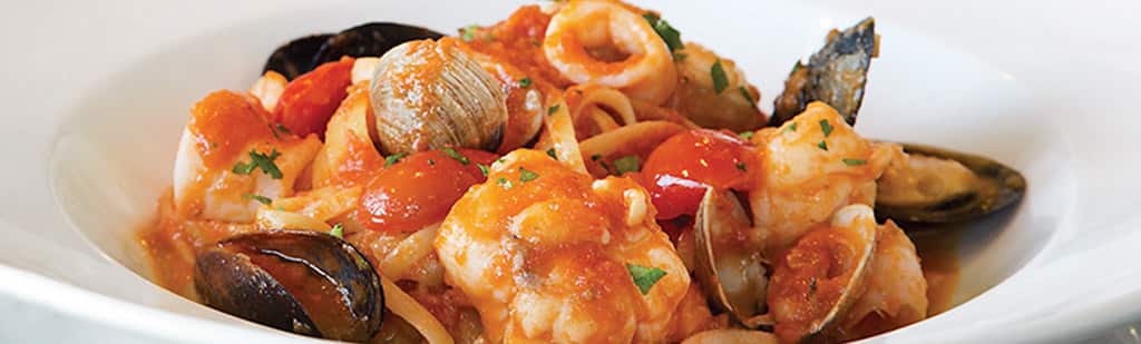 Seafood pasta for dinner onboard Regatta
