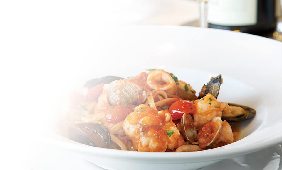 Seafood pasta for dinner onboard Regatta