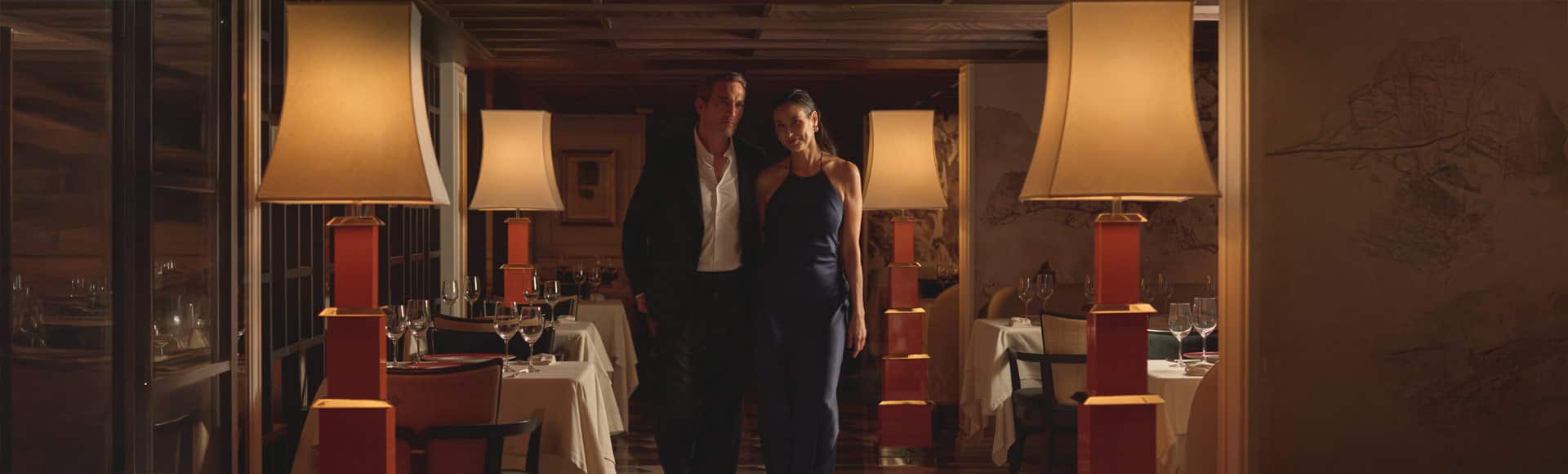 Couple on board Oceania Allura enjoying included specialty dining.